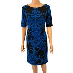Ruched blue and black dress by Connected apparel.